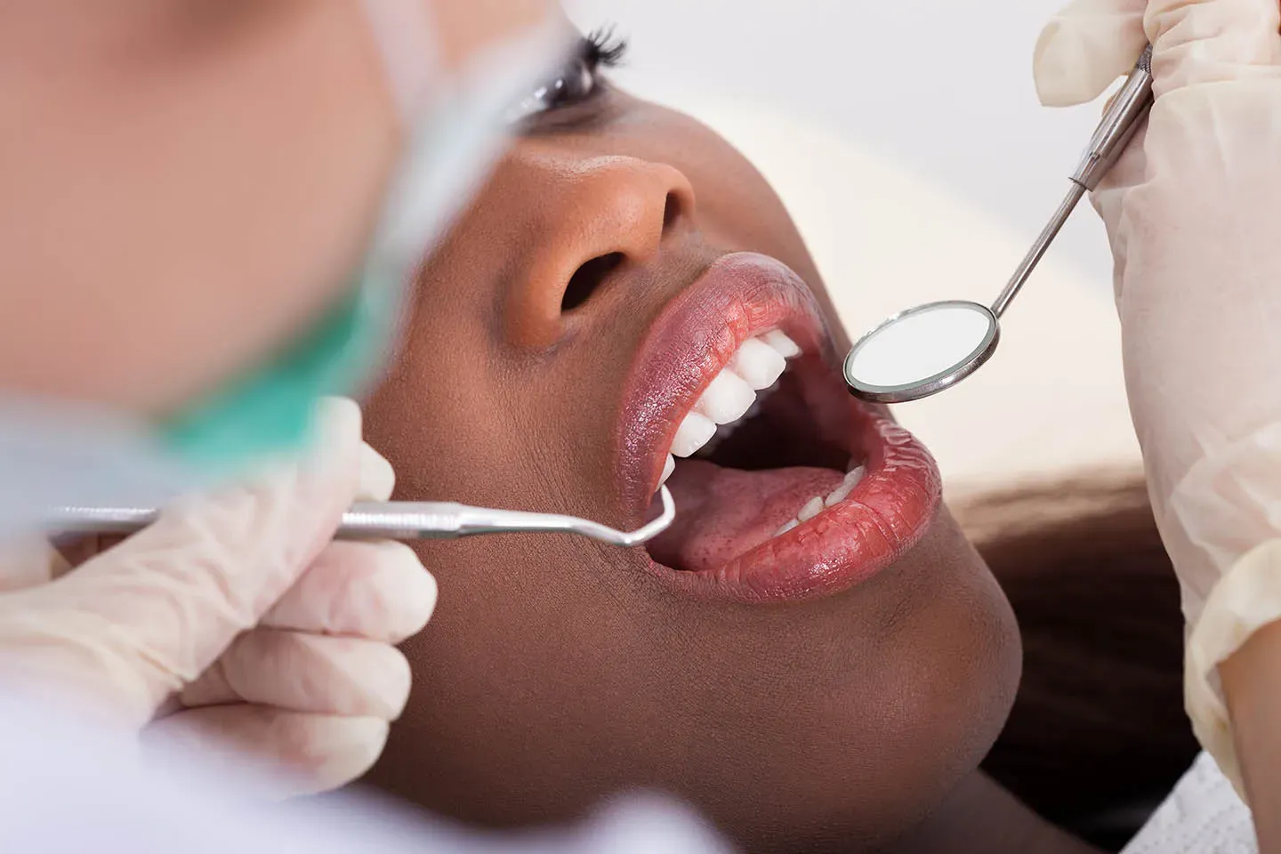 Patient reviewing X-rays with the dental team